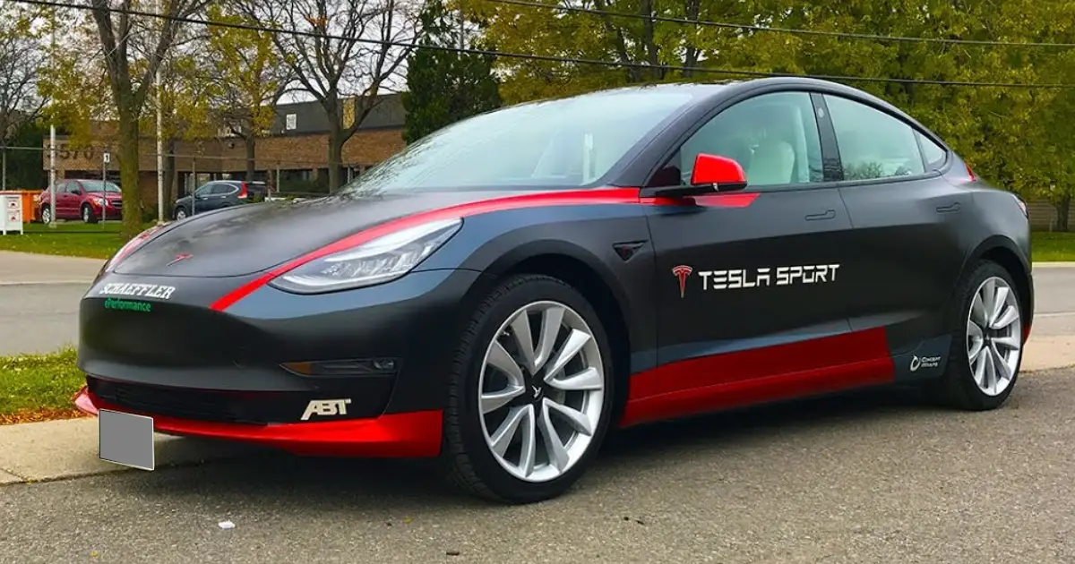 Black Tesla with Red Racing Stripes